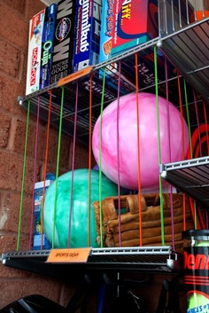 storing balls in garage with bungee cords