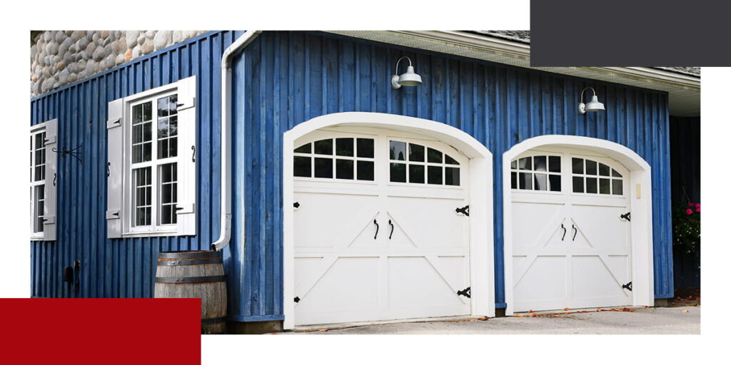 pole barn garage with white garage doors
